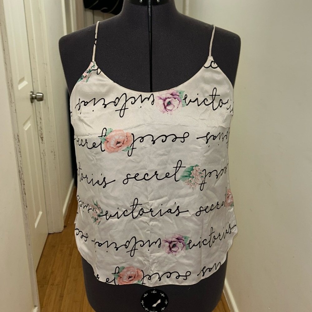 Satin Victoria’s Secret pajama top. Victoria secret branded with floral detail.